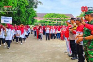 Babinsa Tobat Kawal Gerak Jalan Santai HUT RI 80