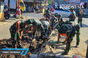 Satgas TMMD Ke-128 Bangun Drainase di Jatirangga Atasi Genangan Air